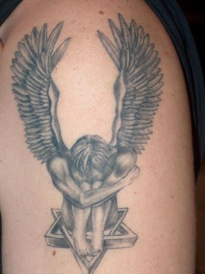 An angel tattoo on man's arm.